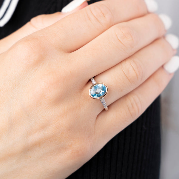 Pre-Owned Blue Topaz and Diamond Ring