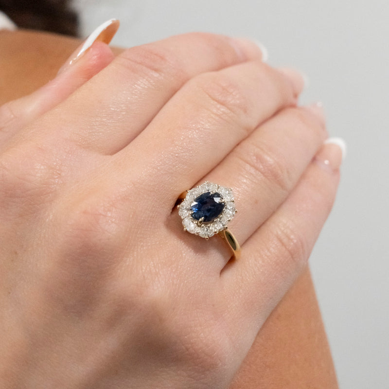 Pre-Owned Blue Sapphire and Diamond Halo Ring