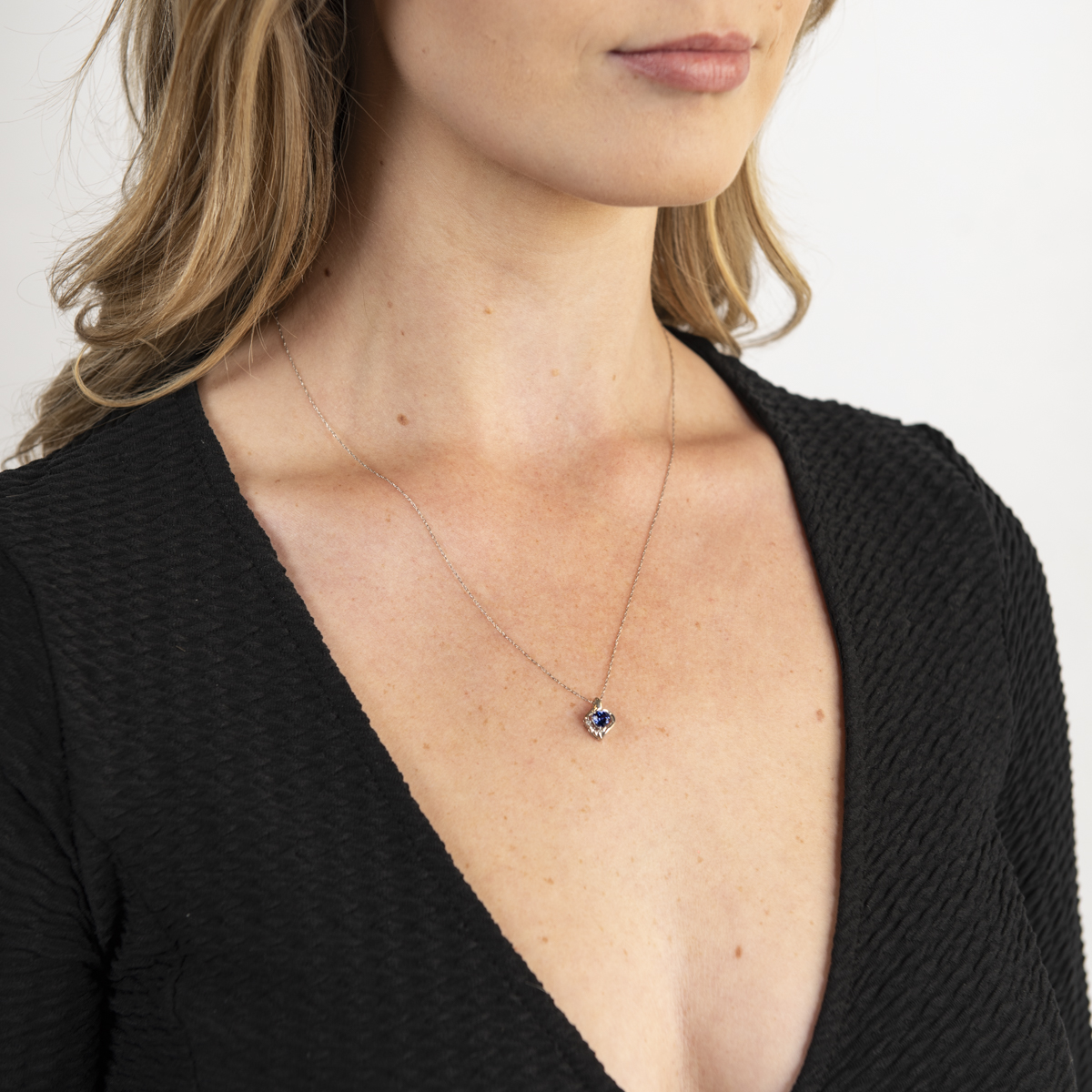 Pre-Owned Blue Heart Synthetic Sapphire and Diamond Pendant